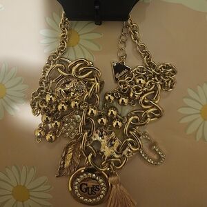 Guess Est. 1981 Gold Tone Beautiful Necklace With Fun Draping Charms